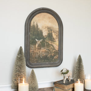 The Framed Vintage Deer Print adds a touch of woodland charm to any living space. The oval-top frame offers a unique touch, and its aged brown finish will bring a cozy, rustic atmosphere into your home. 15"L  x 1"W x  21.50"H  