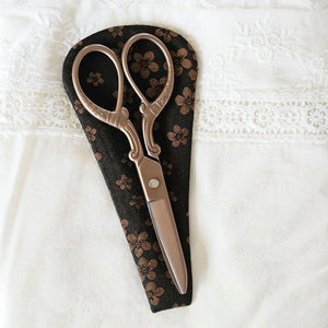 These exquisitely crafted Vintage Style Embroidery Scissors combine elegance and function, perfect for precise cutting in sewing, embroidery, and needlework. Each pair comes with a matching brocade sheath, ensuring safe storage and easy portability. A refined accessory for any craft enthusiast or a thoughtful collectible gift, these scissors bring timeless style to your creative projects. 