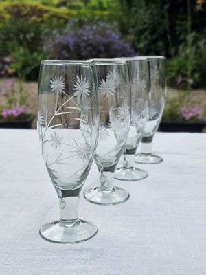 Inspired by antique shop finds, the Vintage Style Etched Flute Glasses, Set of Four brings timeless elegance to any occasion. The etched flower design lends a sophisticated vintage aesthetic that adds character and charm to any table setting. Ideal for farmhouse kitchens, cottage-style entertaining, or as a meaningful gift for those who appreciate quality glassware
