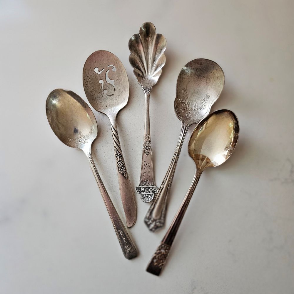 So sweet! So vintage! These darling Vintage Sugar Spoons come as a set of five in various shapes and sizes. No two sets are alike! Found at flea markets and antique shops, these vintage silver plate sugar servers offer unique charm. Due to their vintage nature, flatware pieces may show signs of age and gentle use. No two are alike and the faces and handles will vary with each set.