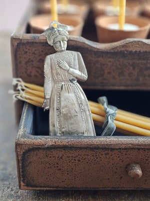 The Vintage Italian Ex-voto, Woman Figure adds eclectic charm to any home. Old Italian Ex-votos, also called Milagros in Spanish, are religious offerings, a gesture of gratitude, for the fulfillment of a vow. &nbsp;These Italian ex-votos are very rare, and now difficult to find. Ours come from Southern Italy, near Naples. Most were collected in the 1990's, but they can be as much as 100 years old. Almost all are silver plate over brass. 