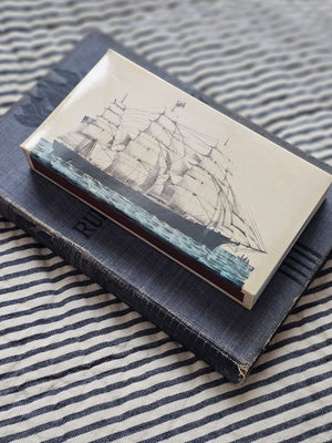 These stylish wood matches, with a Vintage Ship and Whale design, are the perfect complement to any space. Modern, chic, with a vintage graphic design, they are perfect for any room. The match striker is side of the box for easy lighting. Safety matches, 50 sticks per cardboard box. Includes set of two boxes. Each is 4.25" x 2.25" x .75"