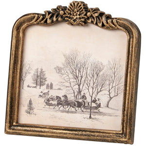 The Vintage Sleigh Ride Framed Wall Art adds a touch of old-world charm to any living space. The oval-top frame offers a unique touch. It features a molded ornate design with metallic antique golden wash over black for a antique look. This winter scene&nbsp;will bring a cozy, nostalgic feel into your home. Frame is plastic with no glass, making it light and easy to hang.