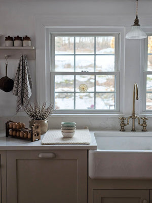 Inspired by antique egg holders, such as ones spotted in the Downton Abbey kitchen, our farmhouse Rustic Wood Stackable Egg Tray will be right at home in your kitchen. It is sold as one tray, and a purchase of two gives you that old-timey stackable look. Makes a great accent for any shelf or countertop. Each rustic wood egg crate holds 12 eggs. Eggs not included. Includes one tray. Purchase two or more for stacking. Made in the USA.