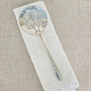So sweet! So vintage! Darling Vintage Tomato Servers are hand-stamped with a floral design along the top and bottom of each server. Made from vintage silver plate servers, each item will be unique. Due to their vintage nature, flatware pieces may show signs of age and gentle use. No two are alike and the face and handle will vary.