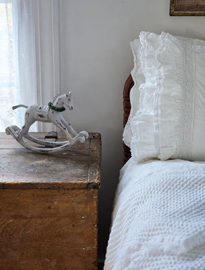 Weathered White Rocking Horse with Wreath