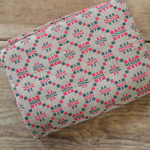 Add antique cottage charm with this Welsh Inspired Throw Blanket, Red and Green. Influenced by vintage Welsh tapestry patterns, this Welsh Inspired Throw Blanket adds instant warmth and character to any room. The throw features dark flax beige with red and green design pattern. It is made from premium cotton and is machine washable for simple upkeep.