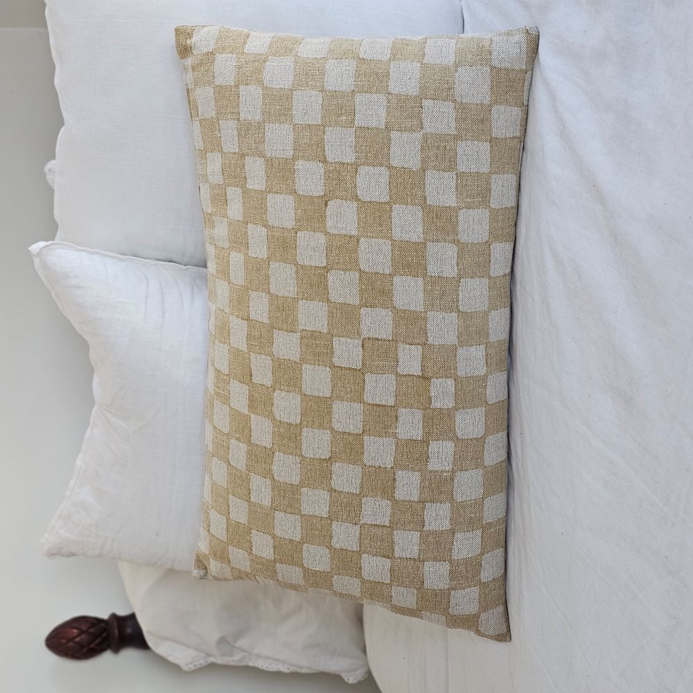 Add cheerful country style to any room with our Golden Wheat and Flax Checkered Pillow. The bright checks lend a fresh farmhouse look. The back features a solid flax linen look with a hidden zipper closure. This accent pillow is ideal for layering and lounging.