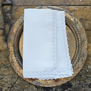 The White Lace Napkins are inspired by 19th century French linens. The edges are decorated with sweet lace trim. These napkins evoke a vintage charm and bring timeless French Country elegance to your farm table. Machine wash. 100% easy care Polyester. Set of Two. 20” x 20”