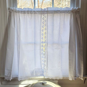 Dress up any window in breezy&nbsp; cottage charm with the White Crochet Lace Cafe Curtains. With crisp white cotton/linen and sweet crochet edging, this farmhouse curtain tier set updates your home decor with a lighthearted country feel. Whether you're going for a coastal, cottage our country look, these cafe curtains add the perfect combination of simplicity and elegance