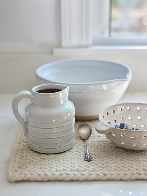 Whitewashed Ribbed Pitcher with Rustic Ceramic Berry Bowl Colander, Mixing Bowl and Knitted Wool Dish Mat 
