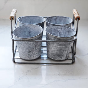 Our Whitewashed Metal Planter Caddy is as versatile as it is beautiful, lending classic vintage charm to whatever it holds. Whether you’re organizing the craft room, getting busy in the potting shed, or creating a farm table centerpiece, this tin pot caddy will surely add a rustic touch.