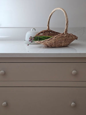 This Willow Gathering Basket Set adds a bit romance and style to the art of gardening and flower collecting. These low profile baskets are also perfect for picnics or keeping your home organized. The ageless beauty of natural fibers are woven together to make these functional, yet beautiful wicker baskets ready to be your workhorse. Create stunning farm table centerpieces by adding your favorite fruits and flowers. English cottage style with functionality at its best. Set of two.