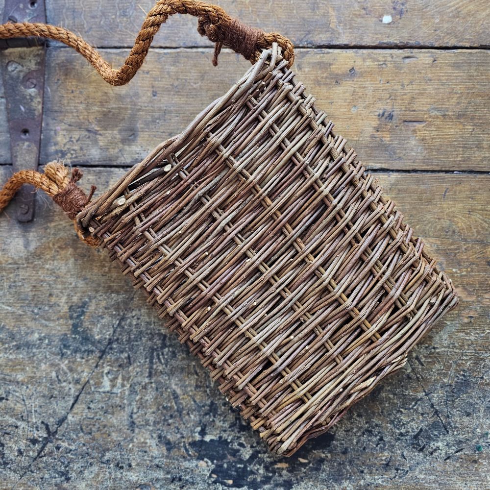 Nothing says English country cottage style quite like natural willow. This Willow Hanging Basket lends charm and easy style in any season. 