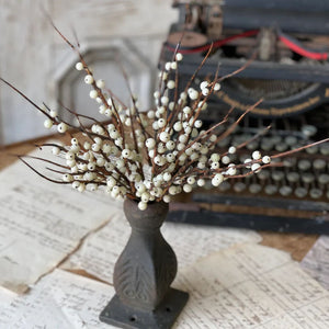 Bring a quiet elegance to your home with this Winter White Berry Bush. Featuring delicate creamy white berries with contrasting brown branches, it effortlessly adds a simple country look to any space