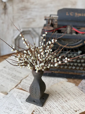 Bring a quiet elegance to your home with this Winter White Berry Bush. Featuring delicate creamy white berries with contrasting brown branches, it effortlessly adds a simple country look to any space