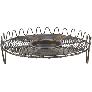 The French Wire Trivet Style Candle Holder merges vintage charm with primitive farmhouse simplicity. Featuring a gray metal wire base with a graceful wave-pattern border, it is inspired by old French wire cooling racks and trivets. 