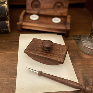 For those who still appreciate communicating via pen and ink, this Vintage Style Wood Ink Blotter is a lovely accessory for your writing needs. Blotter comes with one piece of blotter paper. Please note that we do not sell replacement blotter paper. Pictured pen and inkwells not included.