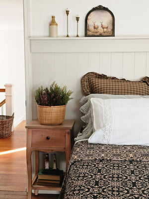  Woodland Cottage Plaid Euro Sham. This 26x26-inch accent piece showcases a refined tartan plaid in nature-inspired hues—olive green, deep reddish-brown, and warm tan—creating a sophisticated yet relaxed aesthetic. 