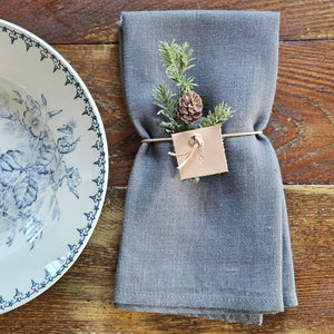 Linen offers a relaxed farmhouse elegance with heirloom-quality charm. The Steel Grey Linen Napkins, Set of Two, will take your table to the heights of casual elegance! Pre-washed for extra softness, these napkins make a fuss-free addition to any decor. Sold in sets of 2. 100% Linen. Size 18 x 18 inches. Made in the USA 