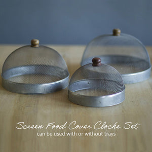 Keep bugs at bay on warm summer days with our Screen Food Covers with Metal Base, Set of Three . A wire mesh cloche, also known as a shoo-fly, is perfect for protecting food from flies and other insects. Our set of three Wire Mesh Food Covers has tons of vintage charm and offers a range of sizes. They feature aged metal base with scalloped edges. Add rustic elegance to your farmhouse kitchen or patio with our vintage style Screen Food Cover Cloches