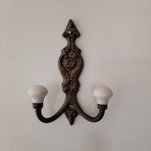 Antiqued Brass Double Hook with Porcelain Knobs