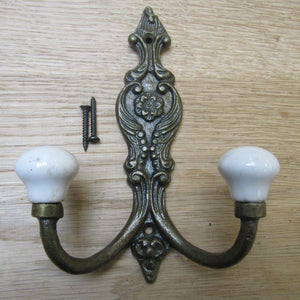 Antiqued Brass Double Hook with Porcelain Knobs