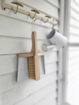 This Dustpan and Brush Set is a must-have around farmhouse living. This set includes an wood and galvanized metal dustpan along with wood and 100% plastic-free brush made from FSC® certified beech wood natural tampico bristles. It features magnets that keep the two together when not in use.