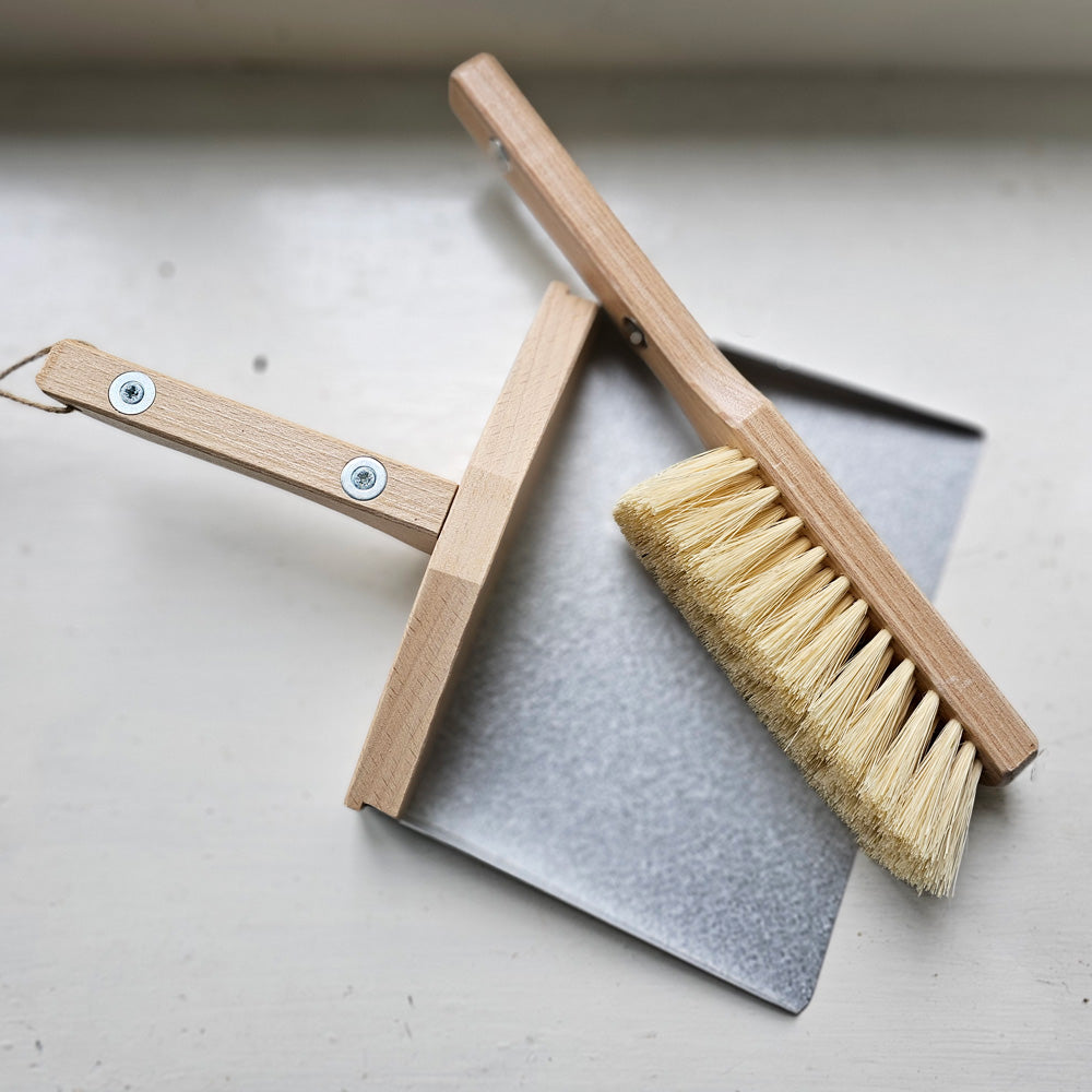 This Dustpan and Brush Set is a must-have around farmhouse living. This set includes an wood and galvanized metal dustpan along with wood and 100% plastic-free brush made from FSC® certified beech wood natural tampico bristles. It features magnets that keep the two together when not in use.