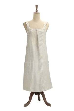 Whether you are crafting or cooking, the Farm Kitchen Smock Apron is perfect for anytime you need coverup. Easily slips over your head so no tying needed. The straps criss cross in back, which is open, so it slips on with ease. Handy pockets on front, made of sustainable 100% cotton with powder blue or mustard stripes. One size fits most.