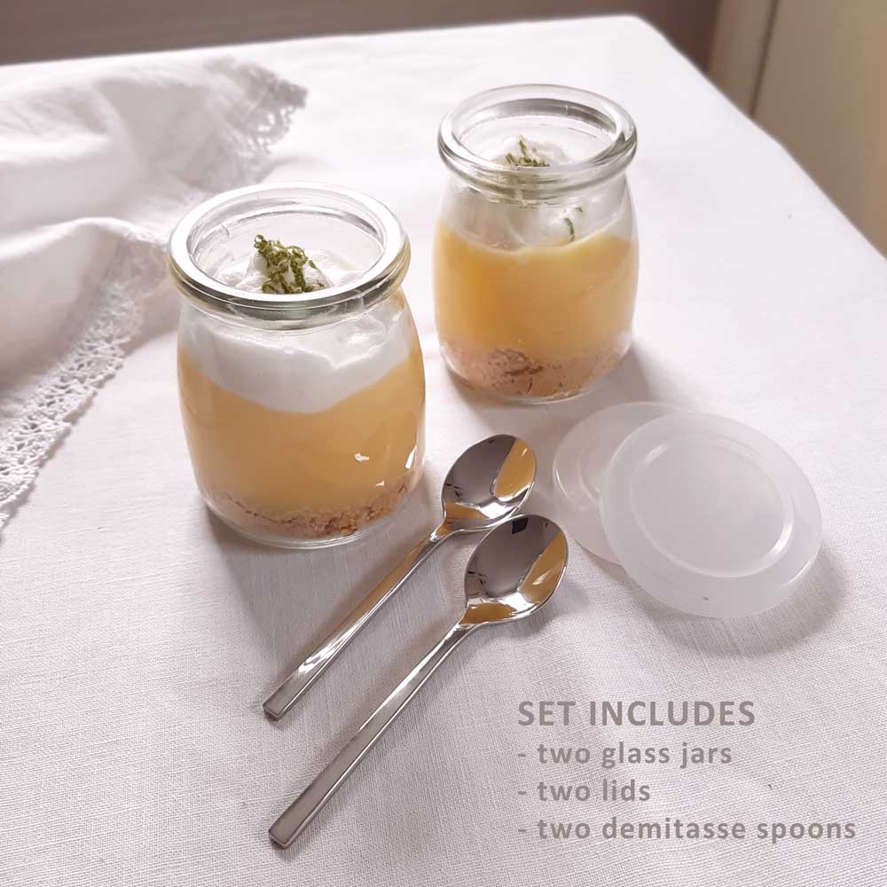 Our French Yogurt Jars and Demitasse Spoon Set inspires a new way to look at canning, dessert making and more. Perfect for jams, jellies, homemade baby food, parfaits, pudding treats and mini pies…the uses are endless.  The set includes two glass French Yogurt Jars, two Lids for airtight freshness, and two Stainless Steel Demitasse Spoons with sleek, minimalist style