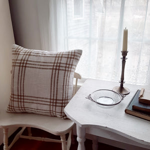 This Wheat and Cream Plaid Pillow Cover lends a bright and fresh farmhouse look to any room. This sweet Wheat and Cream Pillow Cover is crafted of 100% cotton with wood button details on the back. This accent pillow is ideal for layering and lounging. Product dimensions: 18" x 18". Pillow Cover Only (Insert not included) 