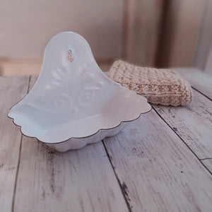 Perfect for small farmhouse bathrooms that lack counter space, our White Enamel Wall Mounted Soap Dish is inspired by flea market finds. It also makes a great sponge holder to keep by the kitchen sink. 