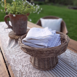 Our Willow Cake Stand Riser is perfect for casual country entertaining and tabletop styling. The natural wicker lends relaxed, French country style that suits both farmhouse and cottage style decor. It will surely add charm, making it the ideal showcase for your sweet treats at your next garden party. 9.5" Diam x 5.5"H